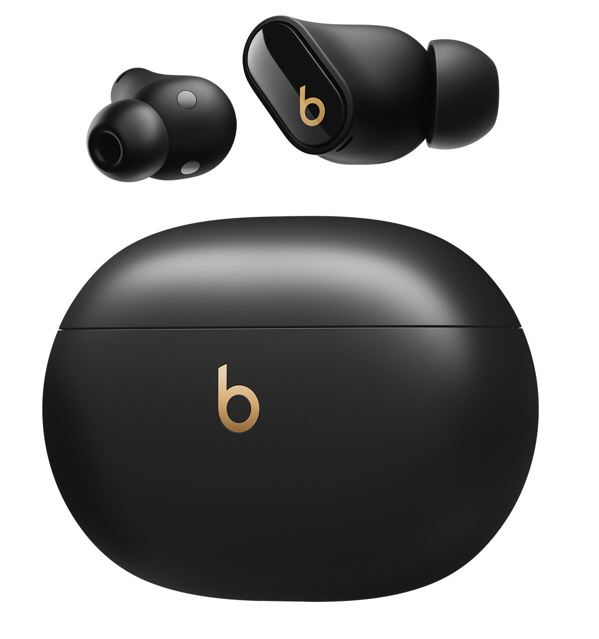 Czarne słuchawki Beats, etui i dwie słuchawki na białym tle.