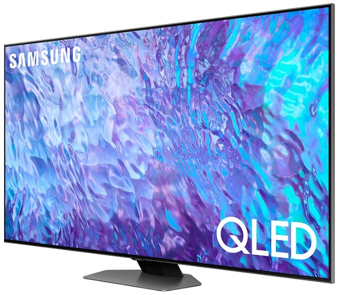 Duży telewizor Samsung QLED, czarna ramka, wyświetlający abstrakcyjne kolory fioletu i błękitu.