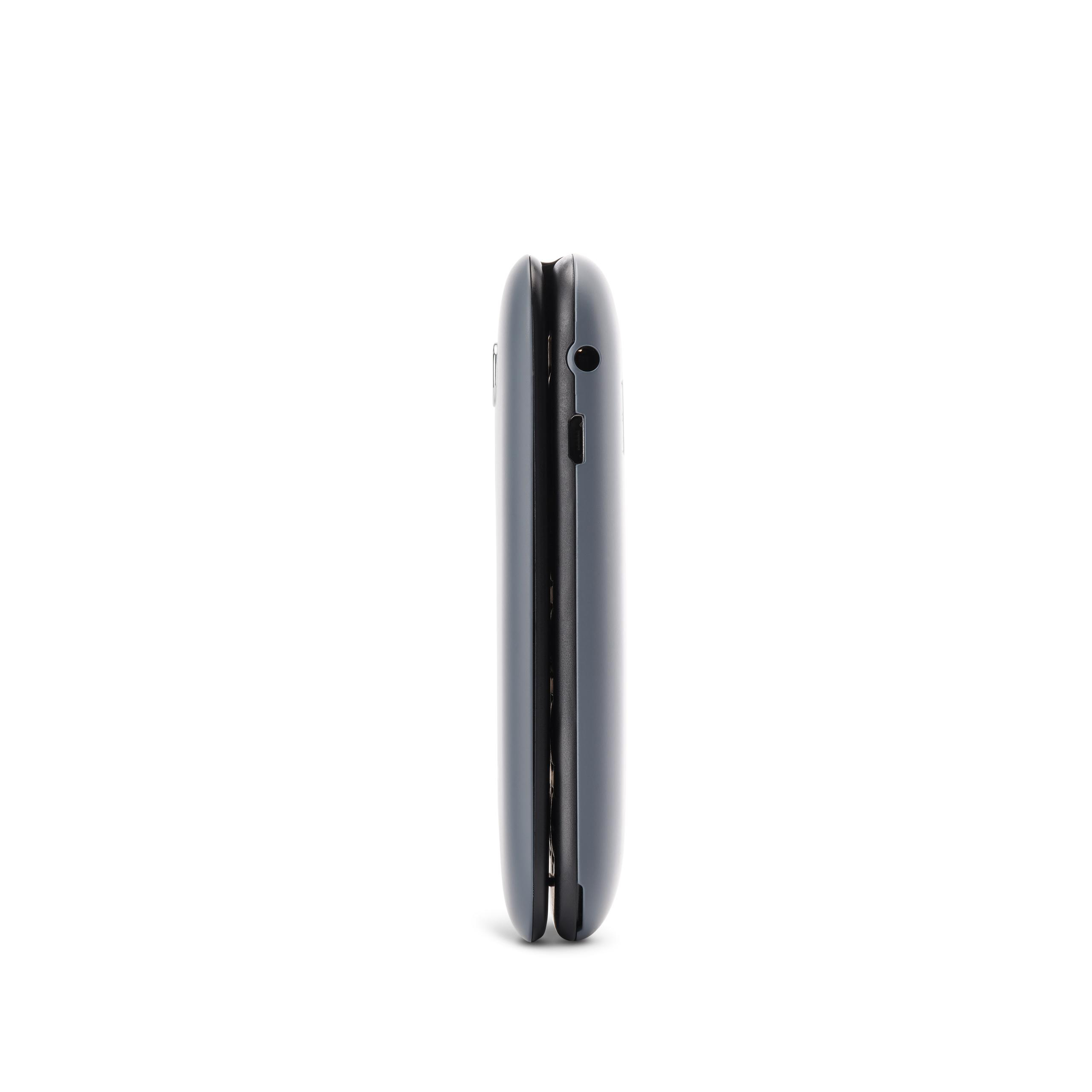 Geschlossenes schwarzes Telefon. Seitenansicht, schlichtes Design, weißer Hintergrund.