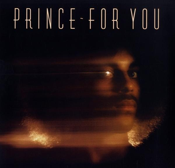 Pochette d'album de Prince, avec un visage flou et le titre 'For You'.