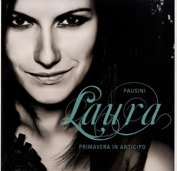 Albumcover einer Frau mit langen schwarzen Haaren, die lächelt. Text: Laura Pausini, Primavera In Anticipo.