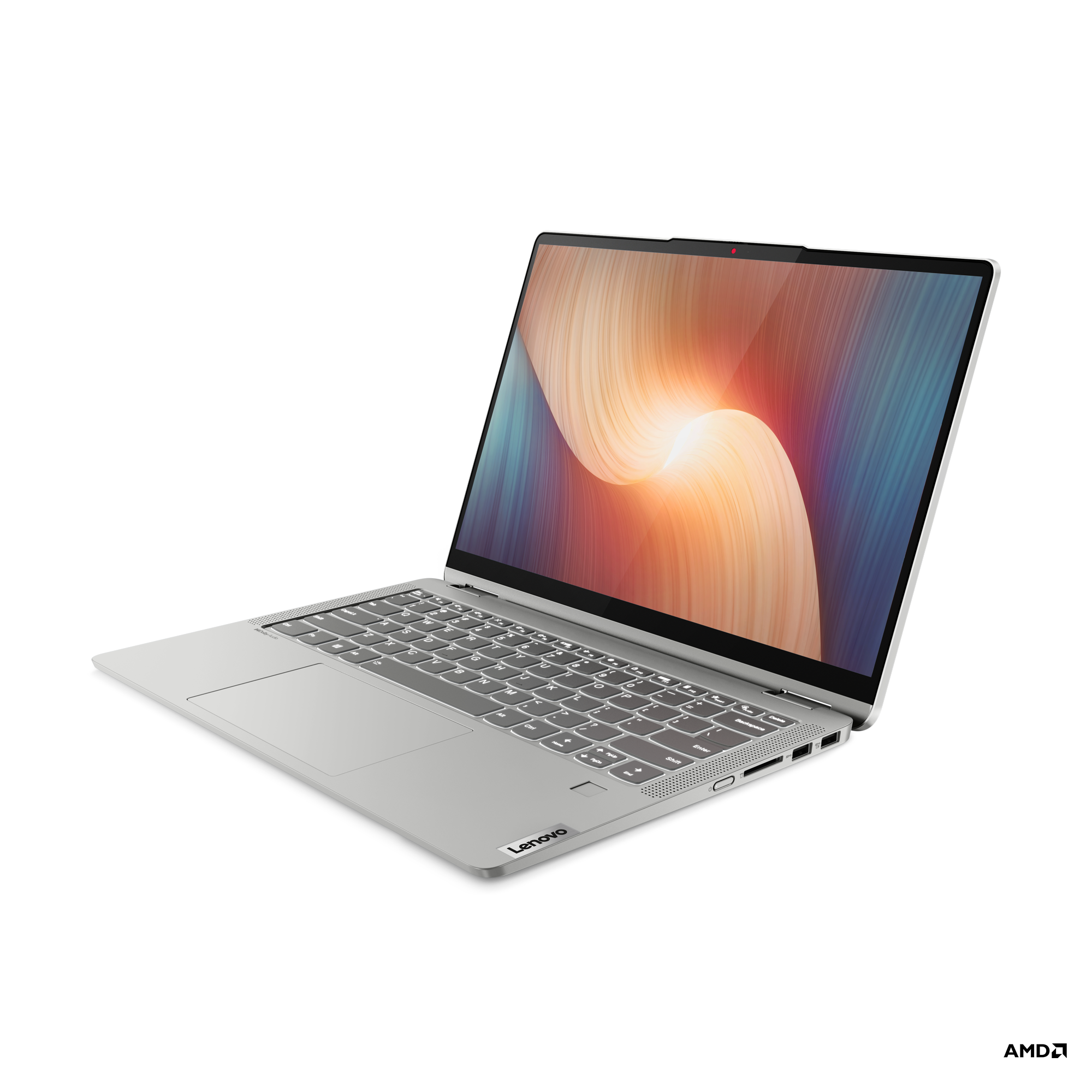 Gümüş bir dizüstü bilgisayar siyah bir yüzeyde açık. Ekran renkli bir gradyan gösteriyor. Lenovo logosu.