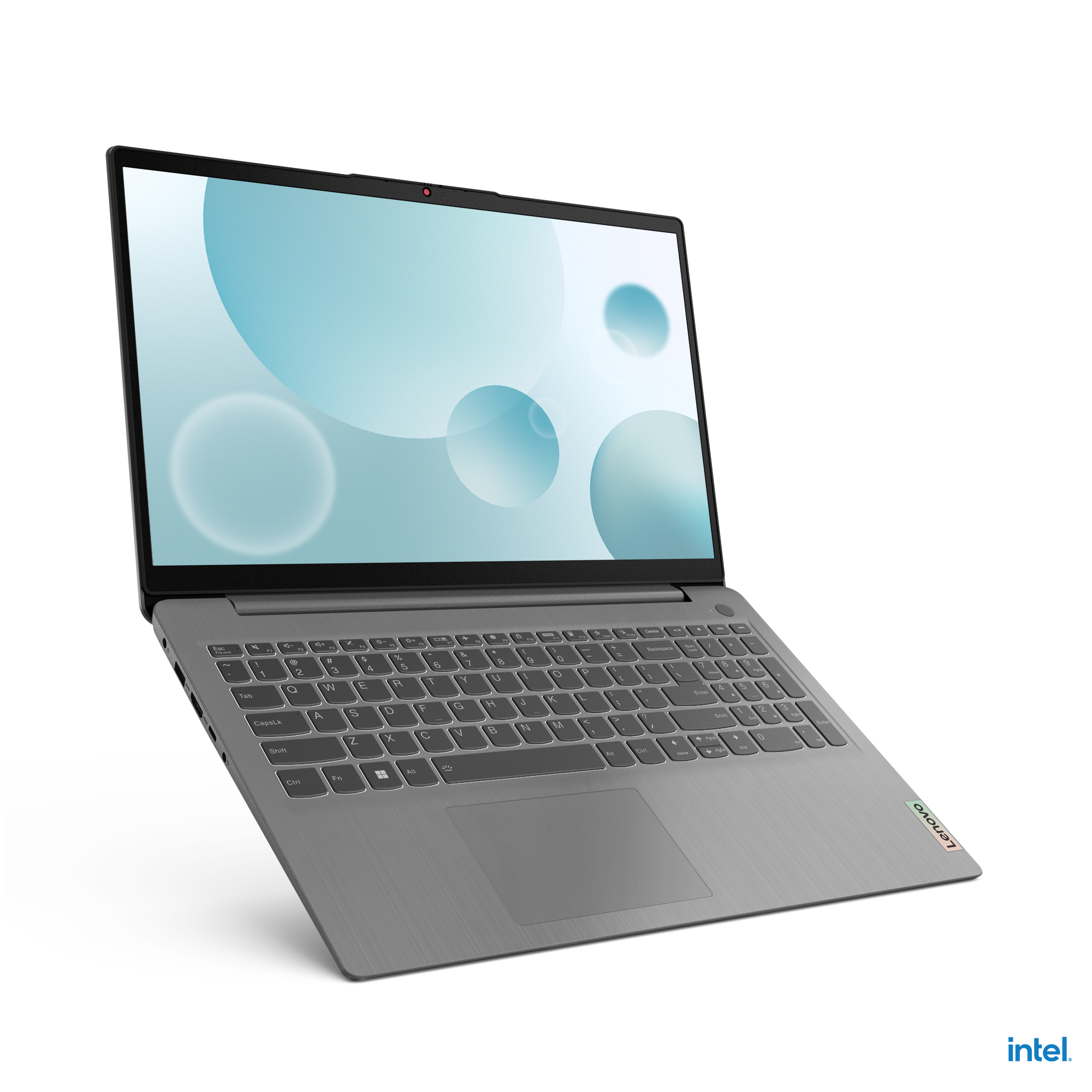 Gümüş renkli bir Lenovo dizüstü bilgisayar, siyah bir arka plan üzerinde açık. Ekran, mavi ve beyaz soyut bir tasarım görüntülüyor.