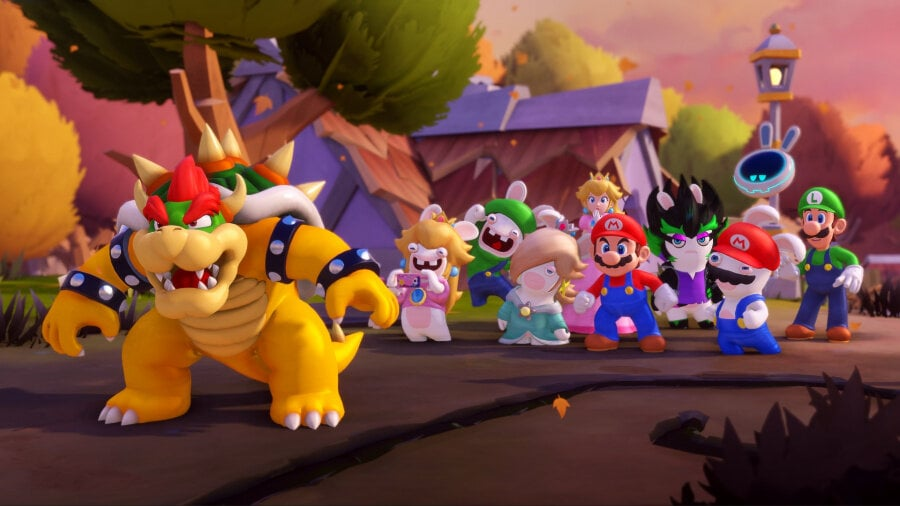 Bowser stoi przed wieloma postaciami z Mario. Tło to kreskówkowe otoczenie z drzewami i budynkami.