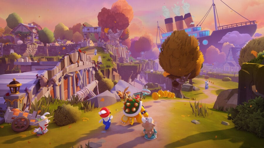 Kolorowa scena z gry z Mario, Bowserem i Rabbids na ścieżce.