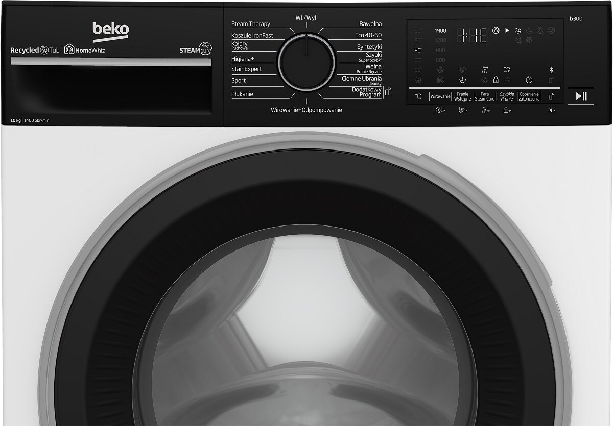 Biała pralka Beko. Panel sterowania jest czarny z różnymi przyciskami i wyświetlaczem.