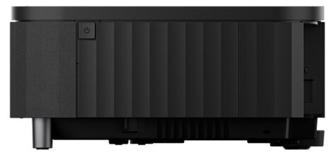 Czarny projektor widok z boku, z przyciskiem zasilania i żebrowanym wzorem.