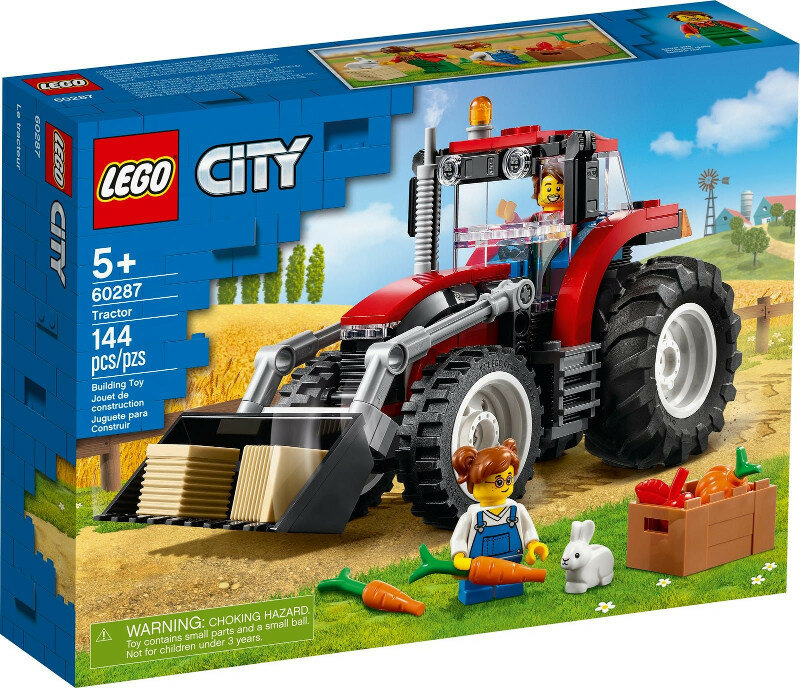 Zestaw traktora Lego City. Czerwony traktor z kierowcą, kobieta z marchewkami i biały królik. Niebieskie pudełko.
