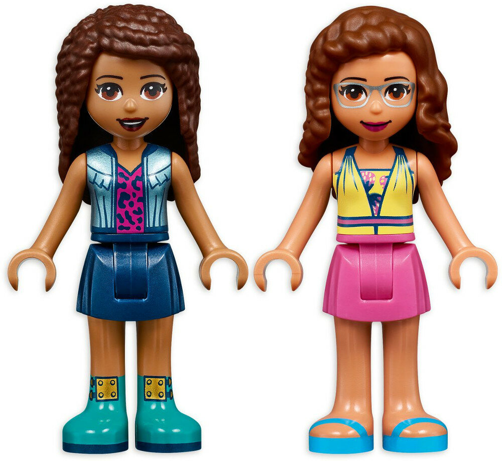 Dwie figurki Lego Friends: jedna z dżinsową kamizelką, druga w okularach i żółtym topie.