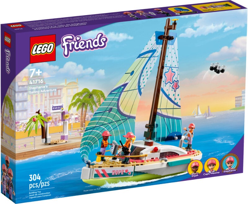 Pudełko Lego Friends: Żeglarska przygoda Stephanie. Łódź na wodzie, ludzie w łodzi i palmy.