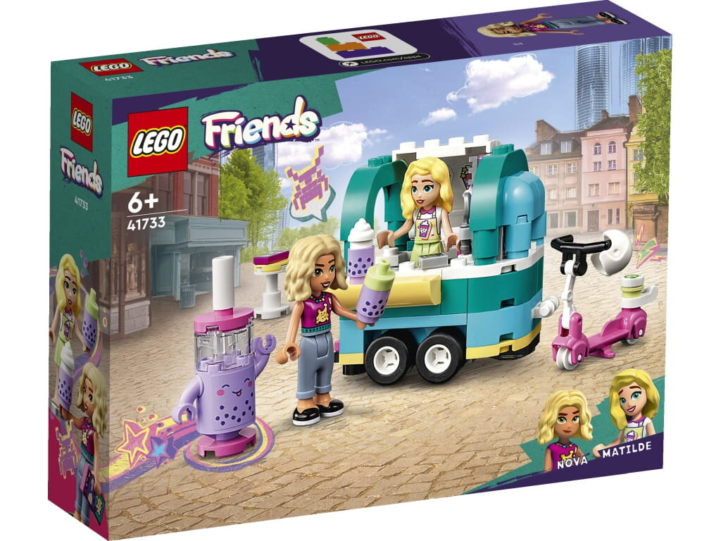Pudełko zestawu Lego Friends. Dwie dziewczyny przy food trucku. Jedna trzyma fioletowy napój boba. Jest skuter.