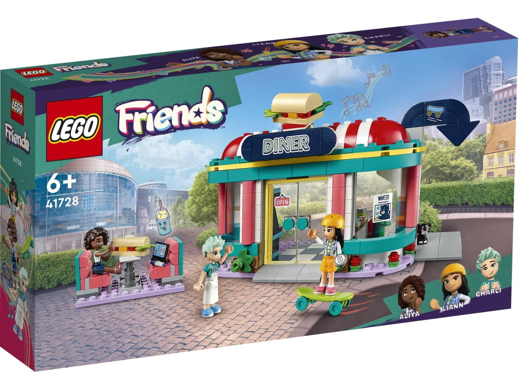 Pudełko Lego Friends ze sceną restauracji. Figury ludzi z przodu.