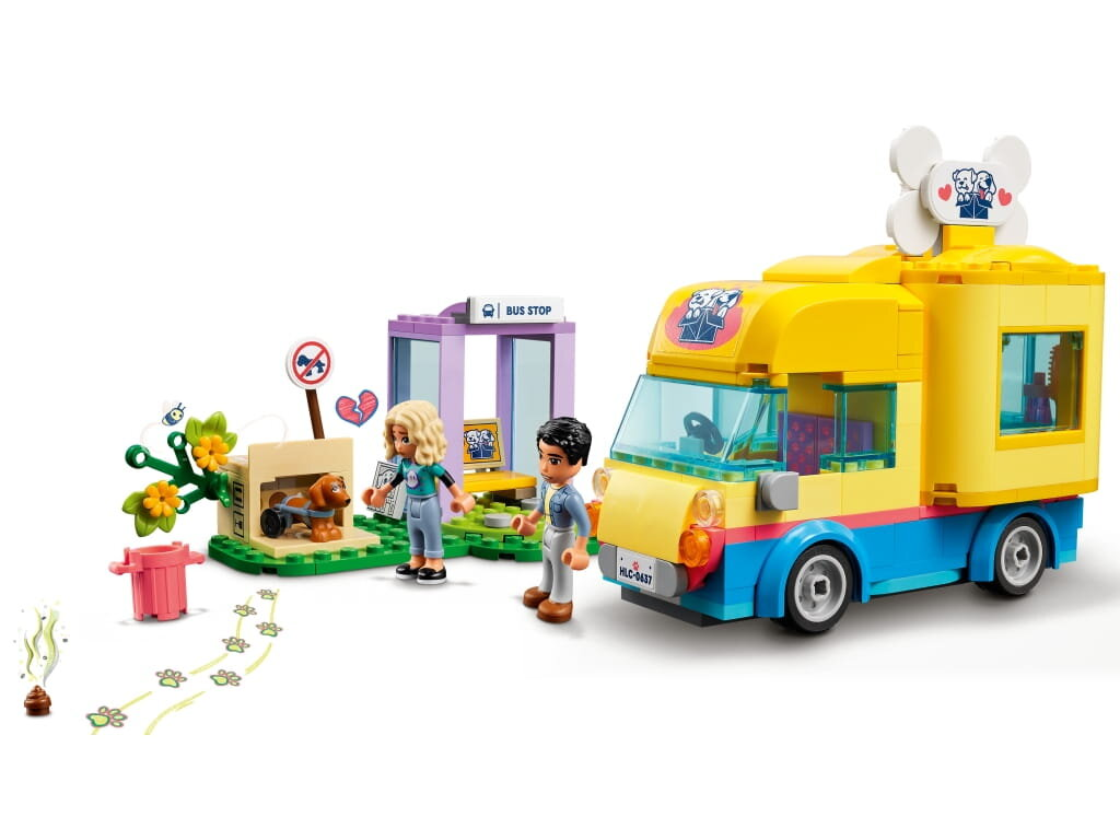 Zestaw Lego Friends. Zawiera przystanek autobusowy, furgonetkę i dwie figurki z psem.