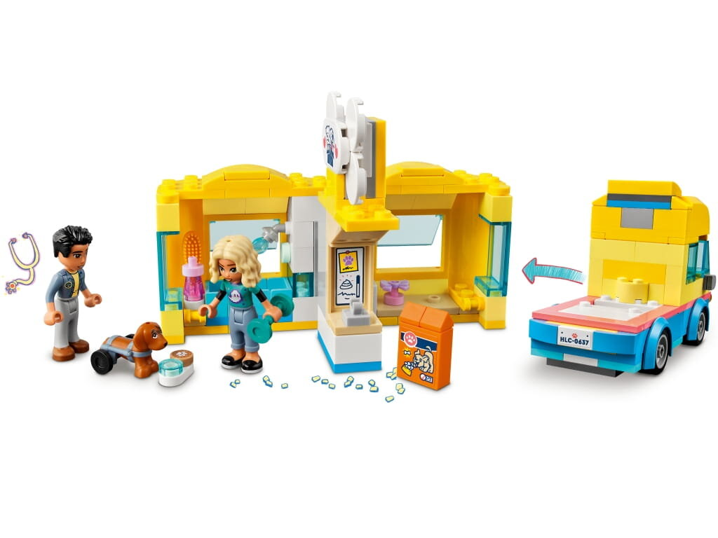 Zestaw Lego z kliniki weterynaryjnej. Zawiera figurki, psa, ciężarówkę i różne akcesoria.