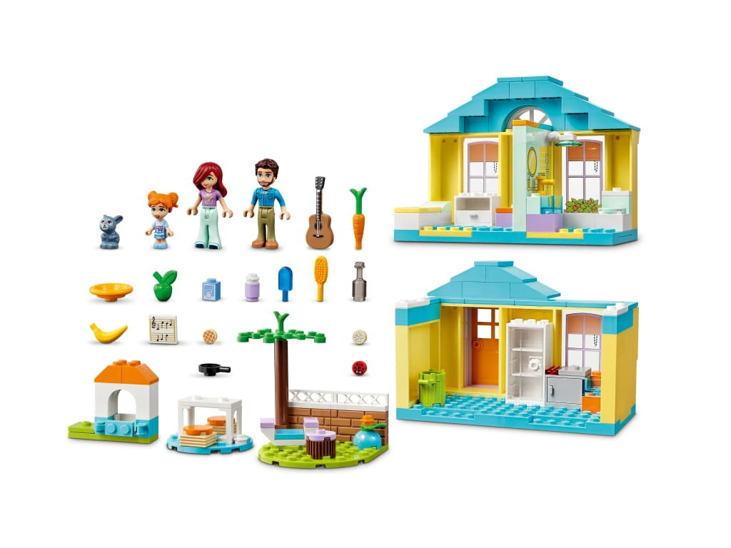 Zestaw Lego: dom z figurkami, akcesoriami i modelem małego domu.