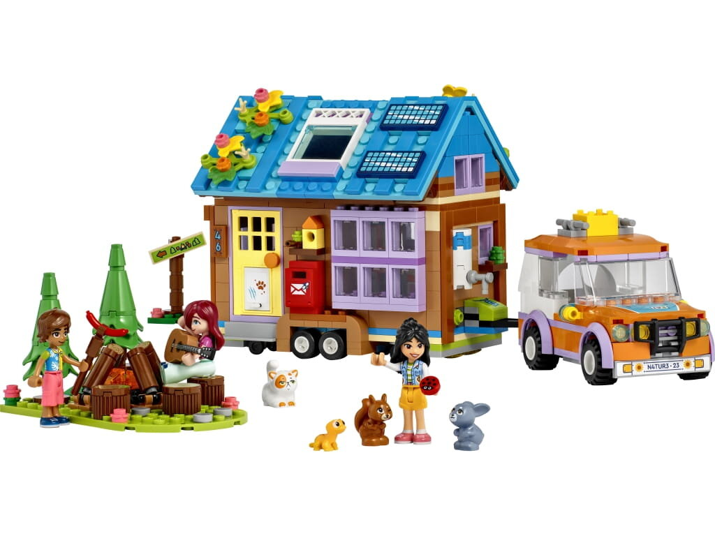 Zestaw Lego Friends z domem, samochodem i kilkoma figurkami, z ogniskiem.
