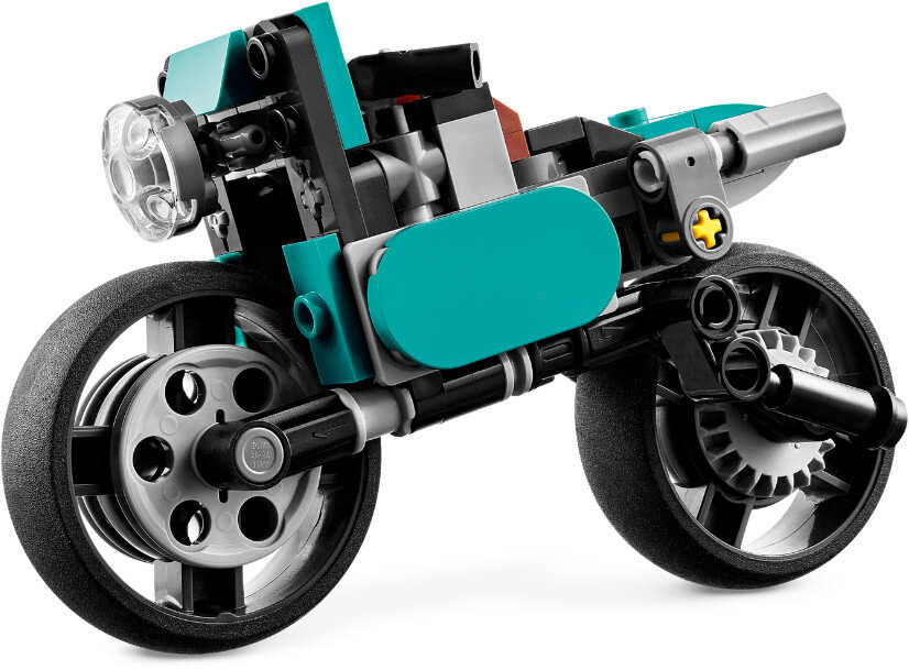 Model motocykla Lego, turkusowy i czarny, z kołami i reflektorem.