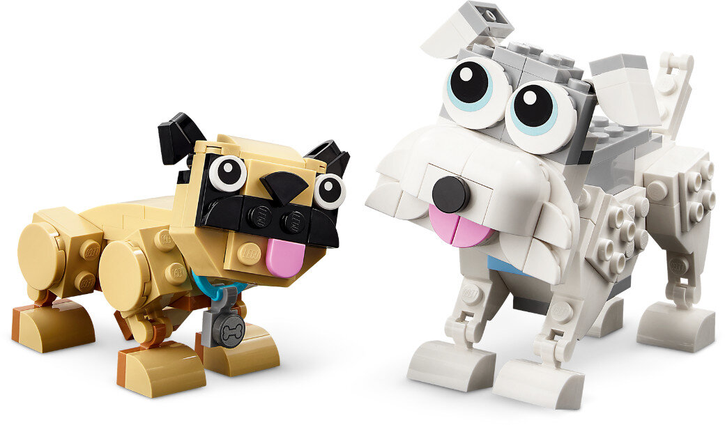 Dwa psy Lego. Jeden beżowy, jeden biały z szarymi akcentami. Oba mają różowe języki i czarne oczy.