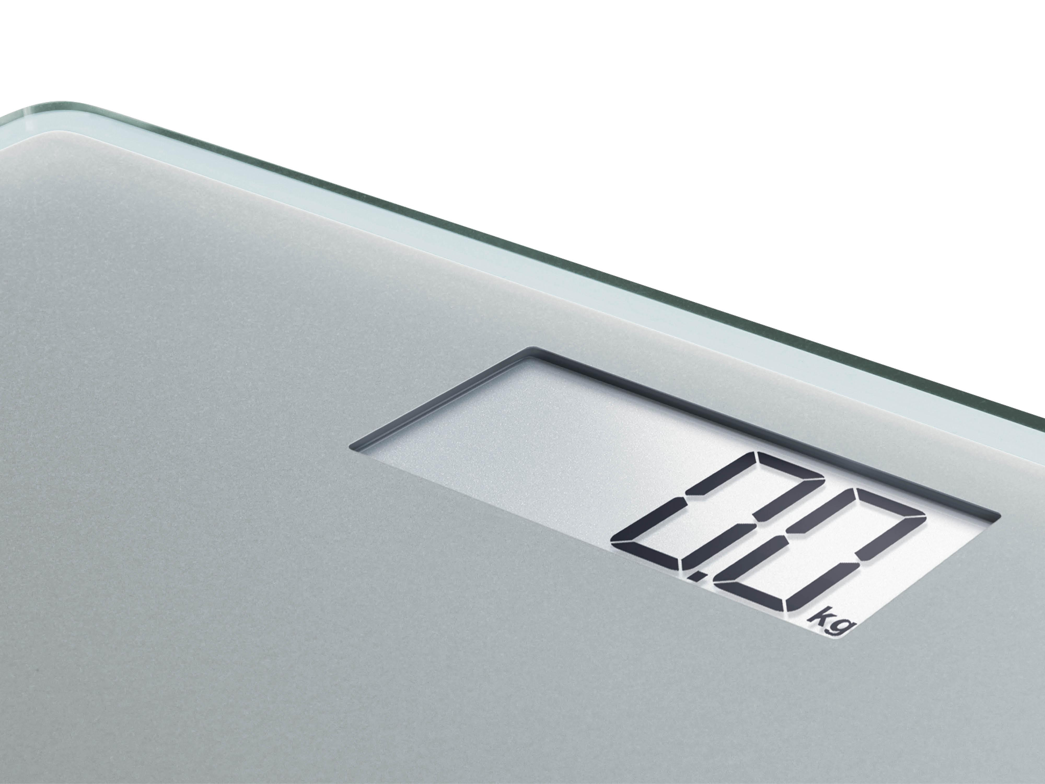 Eine Digitalwaage, die '0,0 kg' anzeigt, auf weißem Hintergrund.
