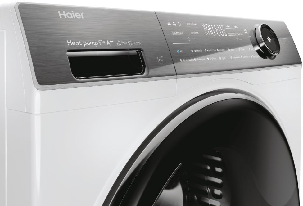 Weißes und schwarzes Haier Waschmaschinen-Bedienfeld. Details sind grau.