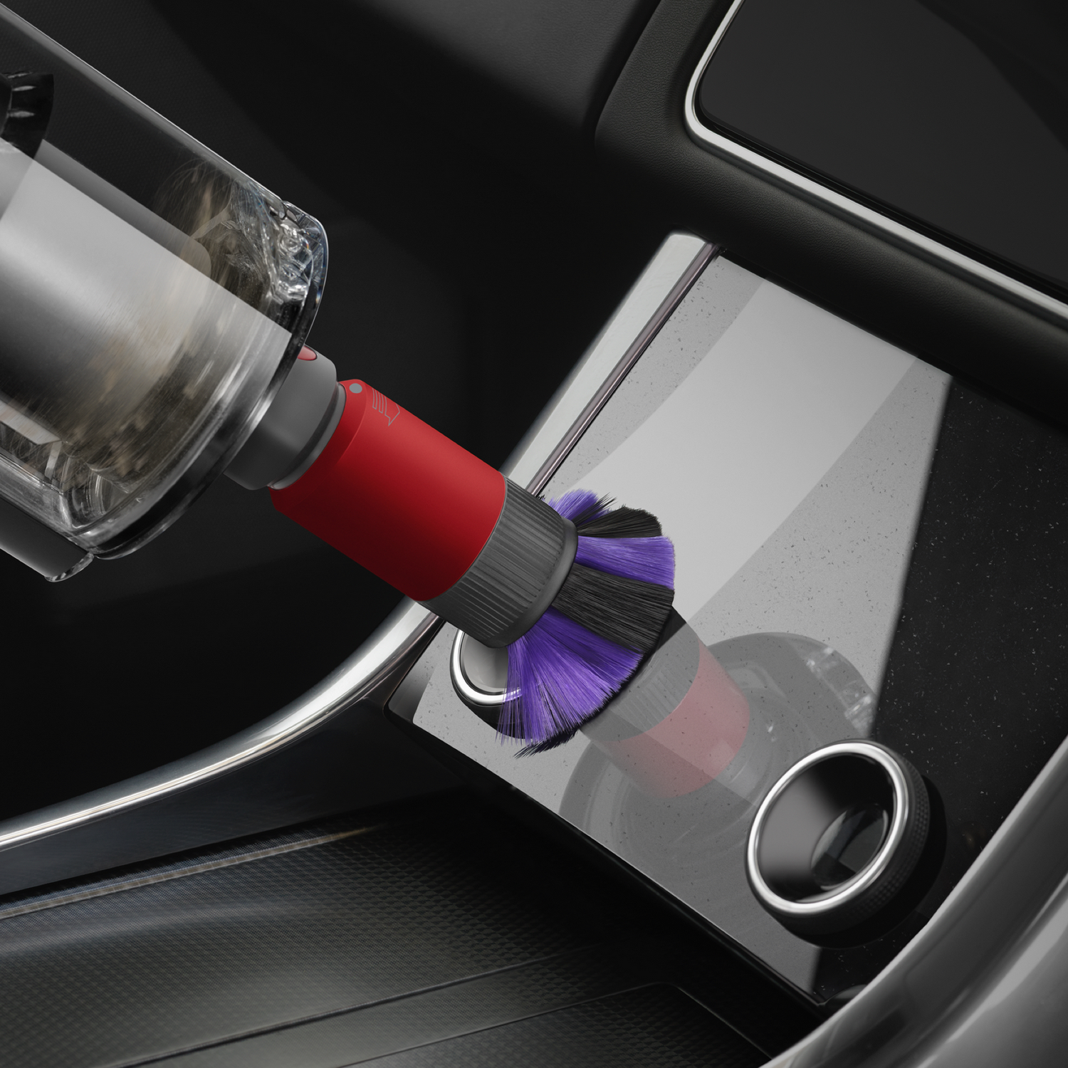 Stofzuiger die een auto schoonmaakt. De borstel wordt gebruikt om het dashboard schoon te maken.