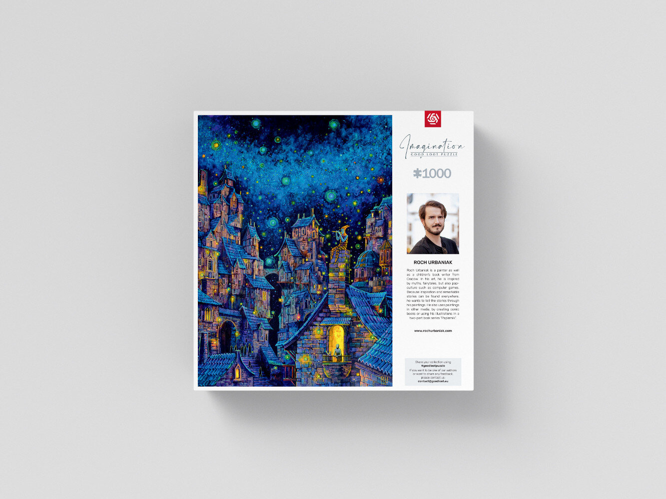 Pudełko z puzzlami z ilustracją miasta na białej powierzchni, z portretem mężczyzny.