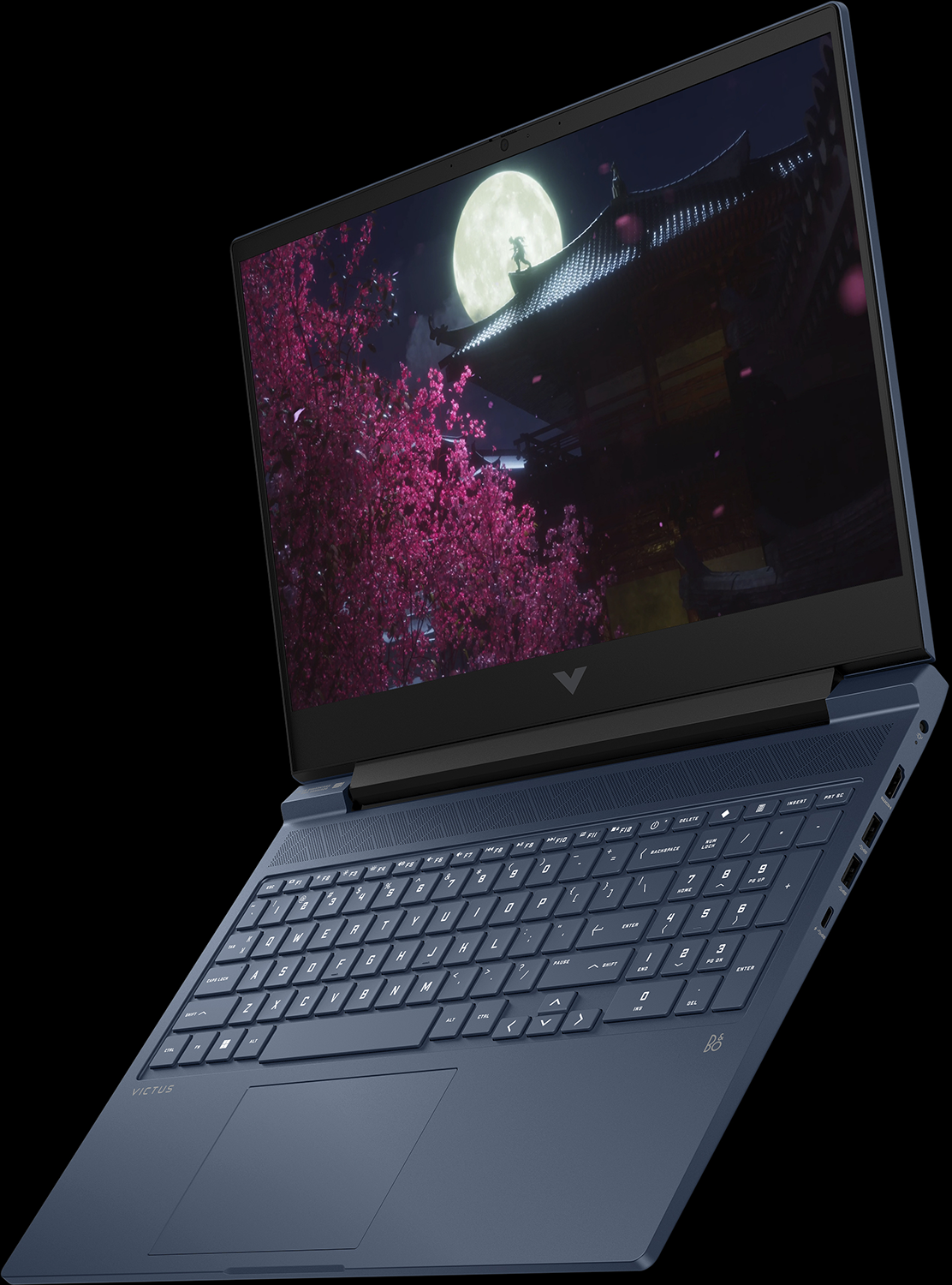 Ordinateur portable montrant une scène de nuit avec pleine lune, fleurs de cerisier et bâtiment japonais, bleu foncé.