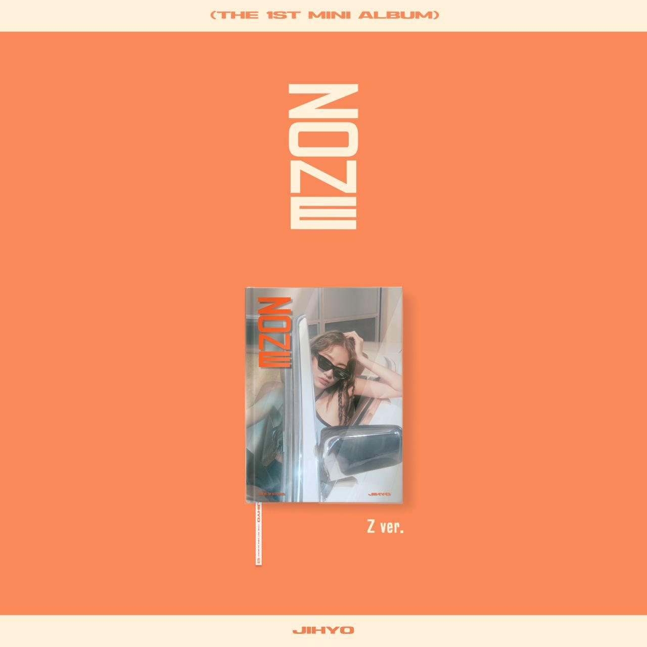 IZ*ONE album borító, napszemüveges nővel, aki kilóg egy autó ablakából.