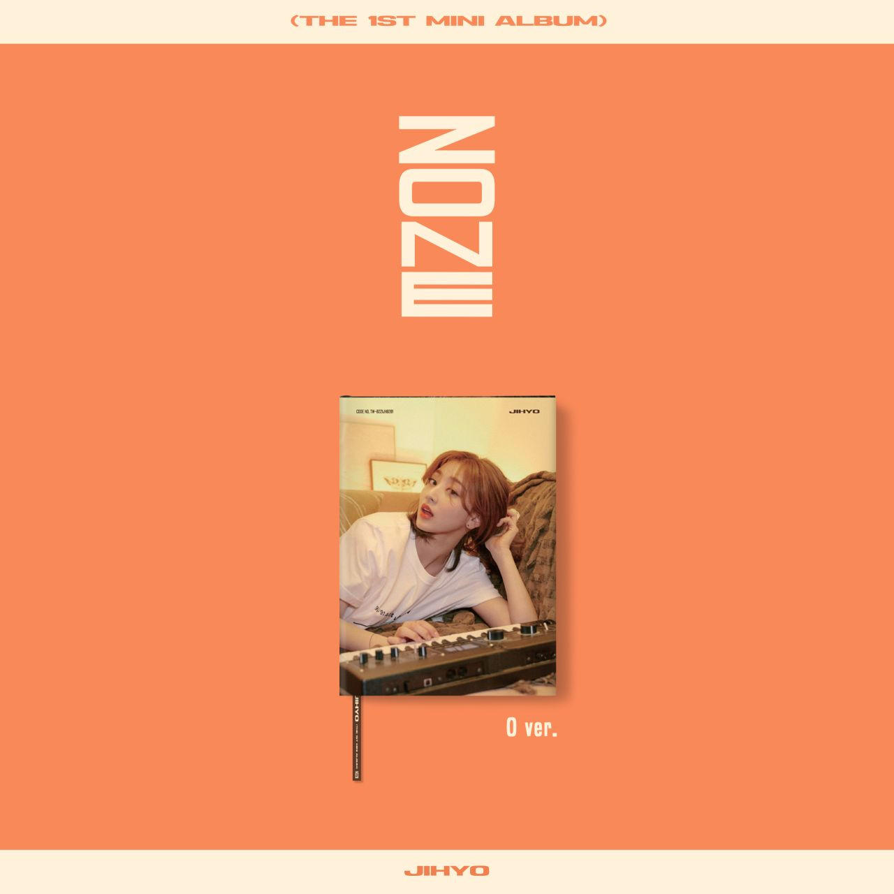 IZ*ONE album borítója. Egy nő fekszik és a kamerába néz. A háttér narancssárga.