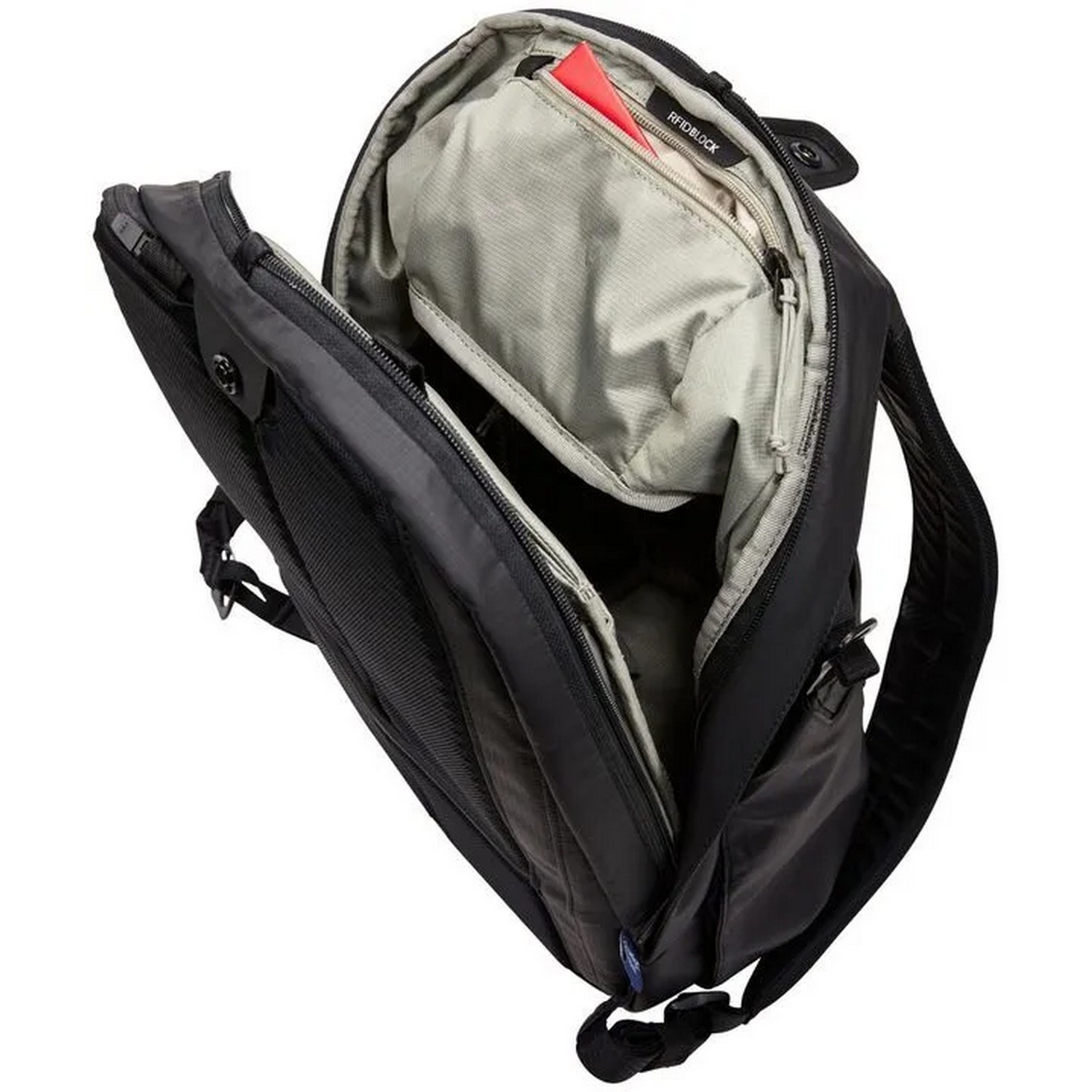 Un sac à dos noir avec le dessus partiellement ouvert, montrant les compartiments intérieurs.