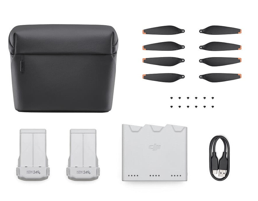 Akcesoria do drona: etui, śmigła, baterie, hub ładujący i kabel USB.