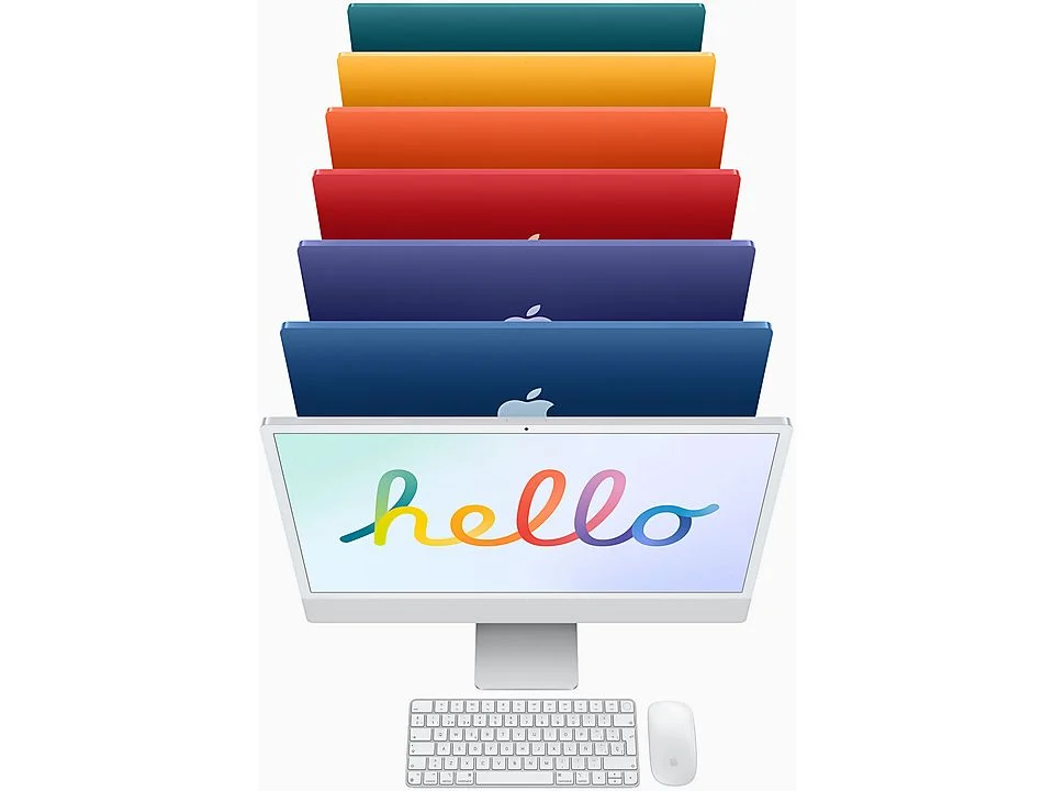 Un ordenador iMac blanco con un 'hola' en arcoíris en la pantalla.