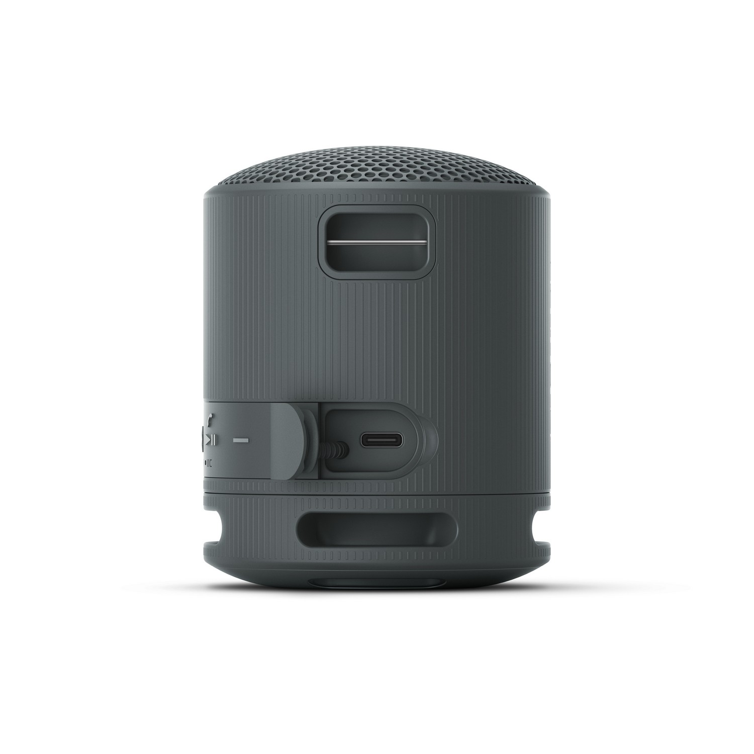 Enceinte grise avec boutons et ports, design cylindrique avec surface rainurée.