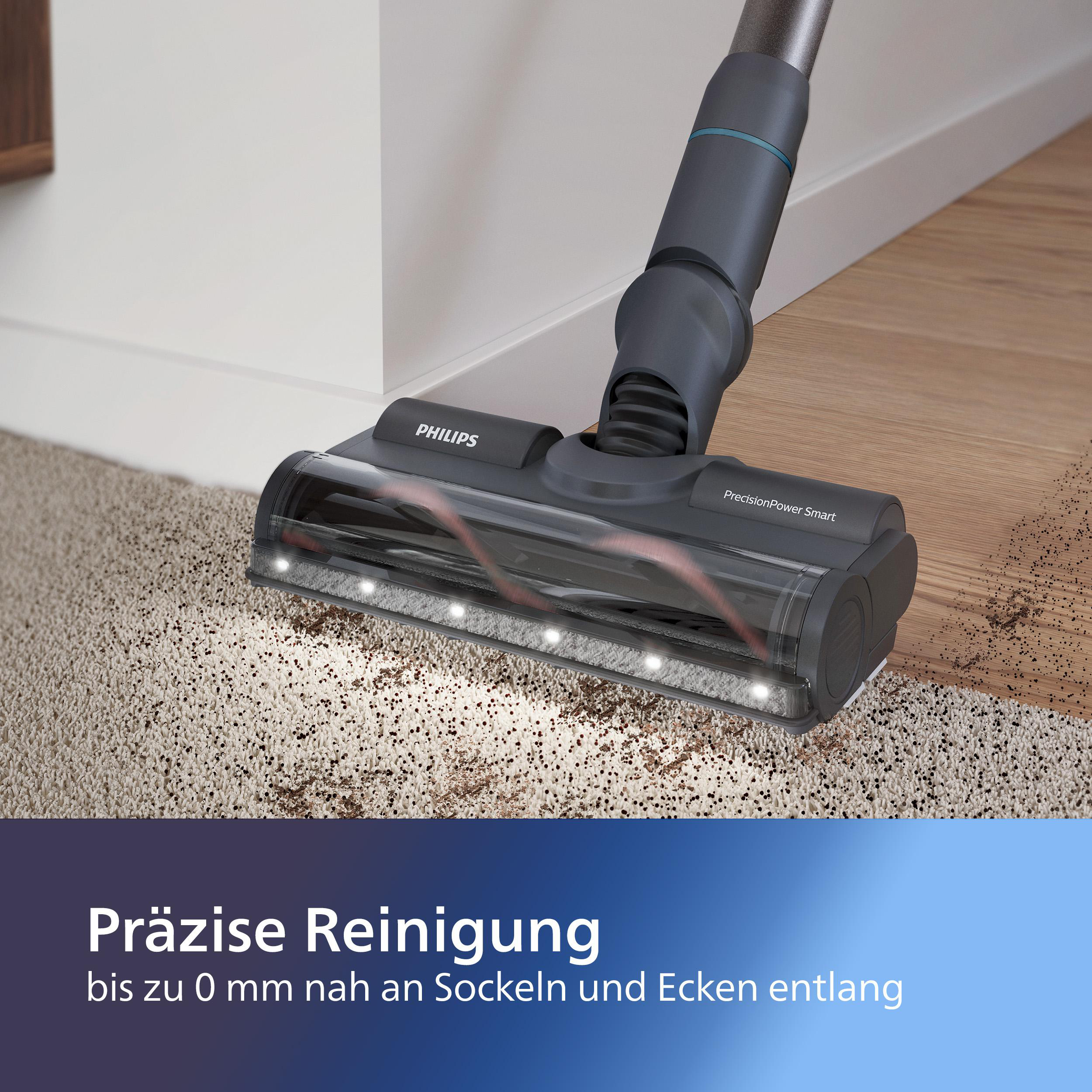 Staubsaugerkopf auf Teppich. Text sagt 'Präzise Reinigung' an der Sockelleiste.