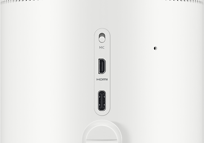 Fehér hengeres eszköz MIC, HDMI és USB portokkal.