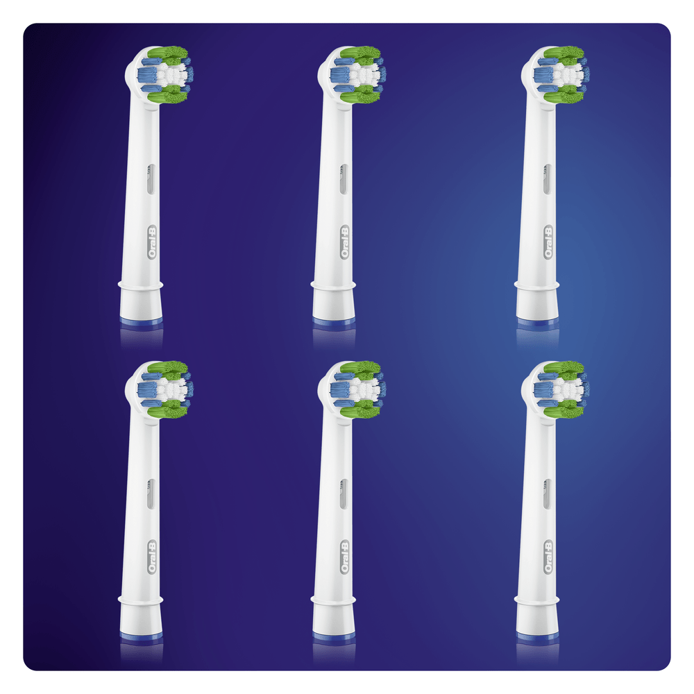 Seis cabezales de cepillo de dientes Oral-B, blancos con cerdas verdes y azules, dispuestos sobre un fondo azul.