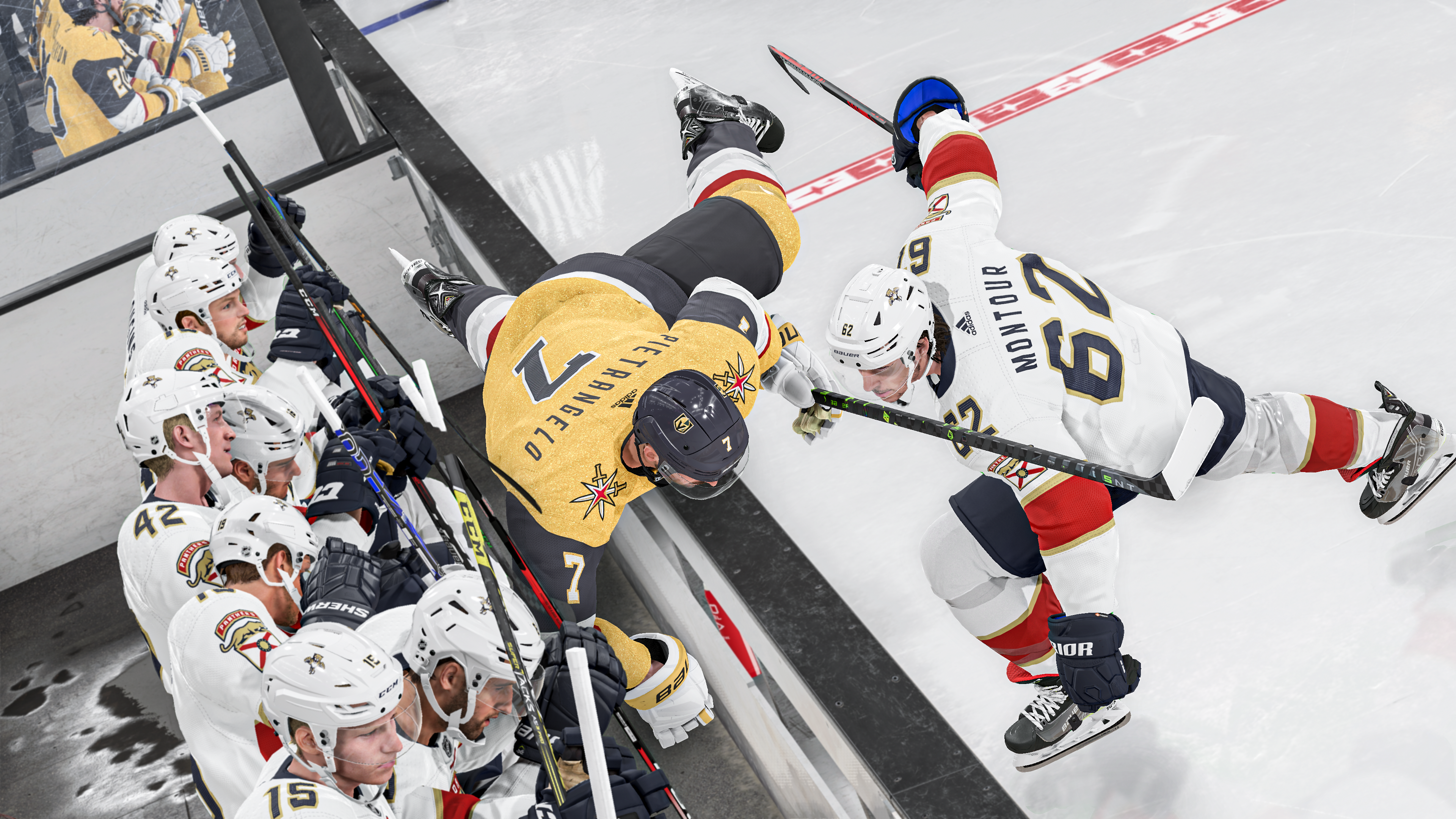 Eishockeyspieler auf dem Eis, kämpfen um den Puck. Ein Spieler fällt, andere umringen ihn.