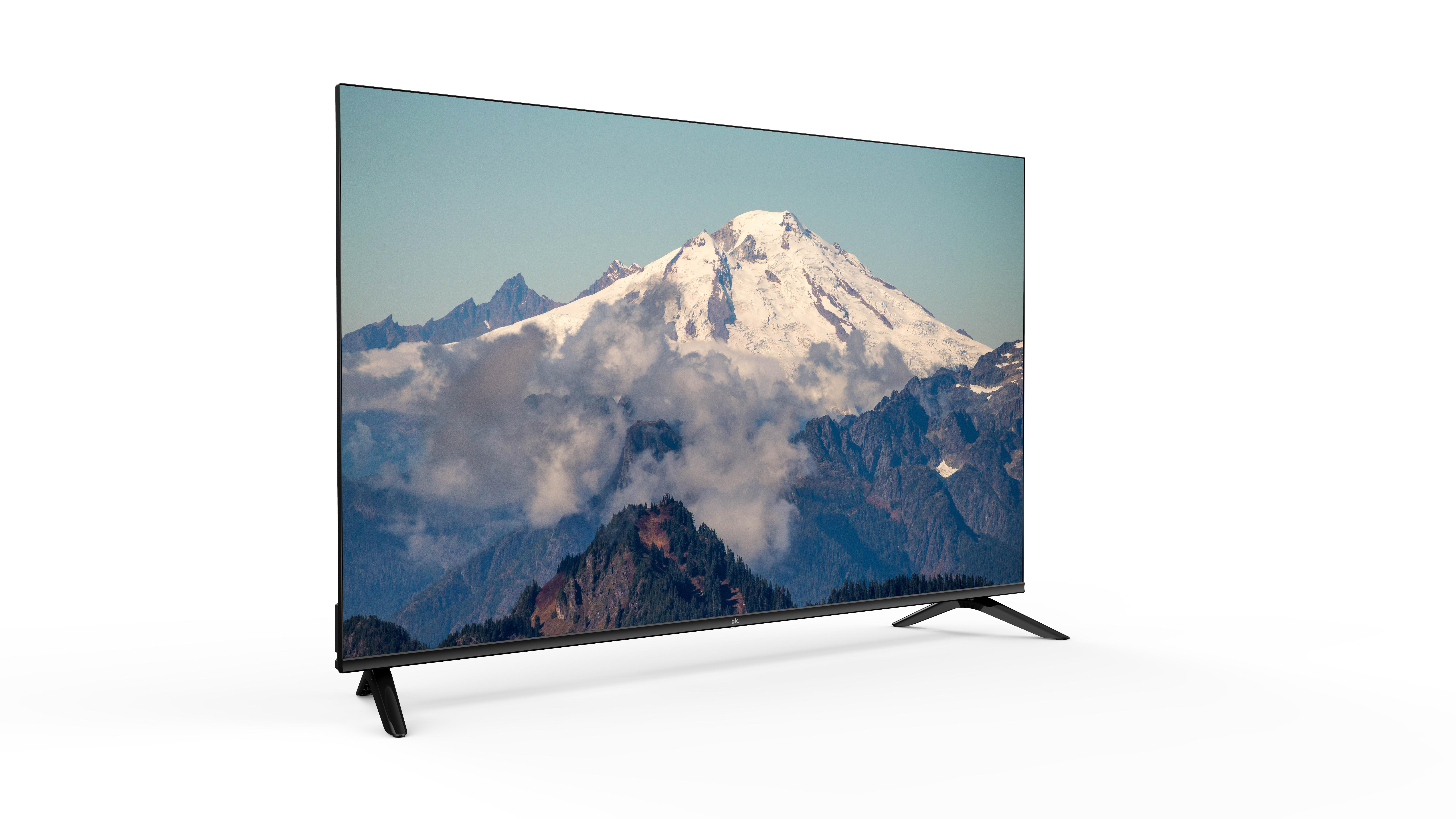 Ein Großbildfernseher, der eine malerische Berglandschaft zeigt.