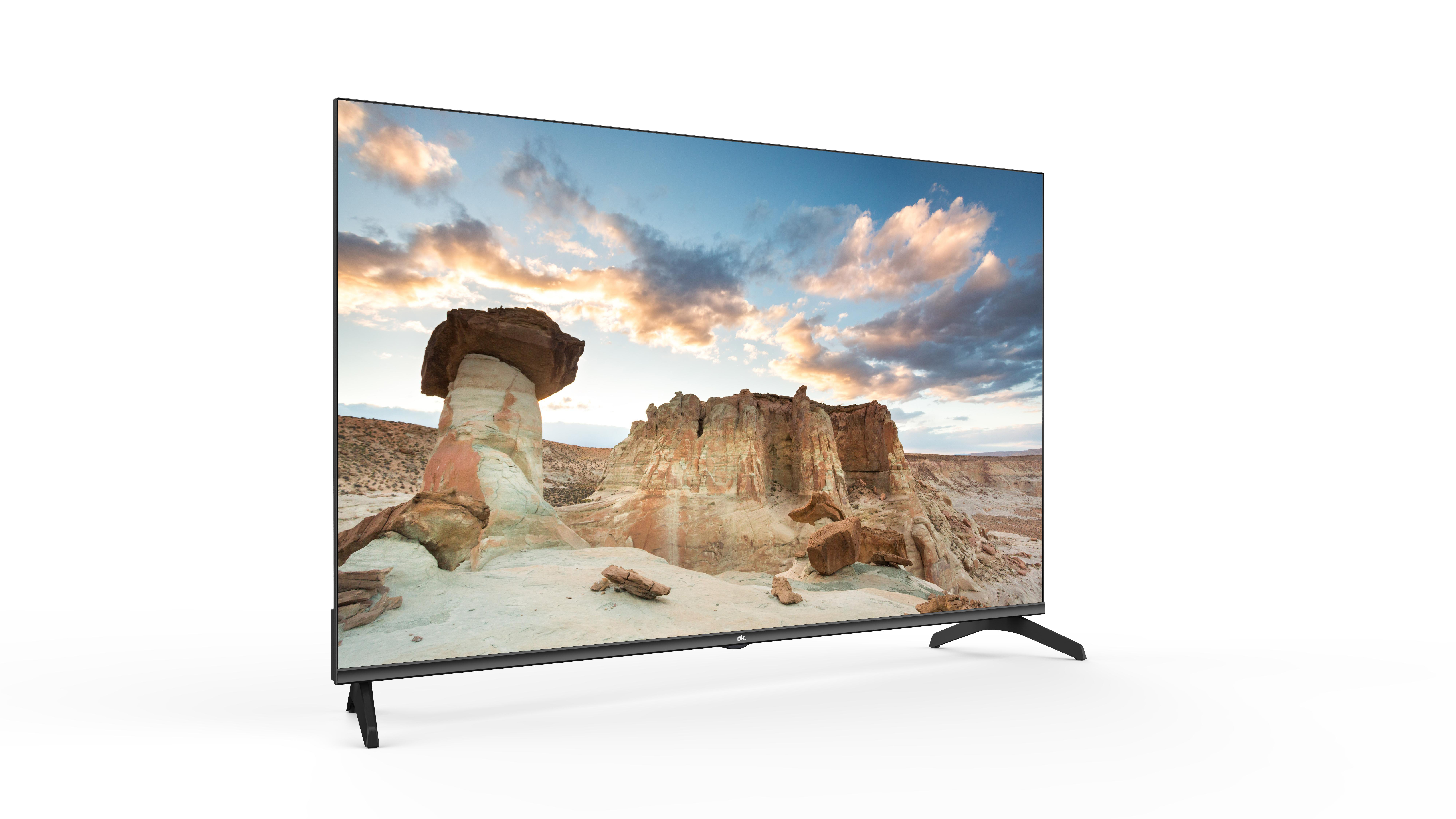 Der Fernseher zeigt eine Wüstenlandschaft. In der Mitte befindet sich ein Hügel. Der Himmel ist blau mit Wolken.