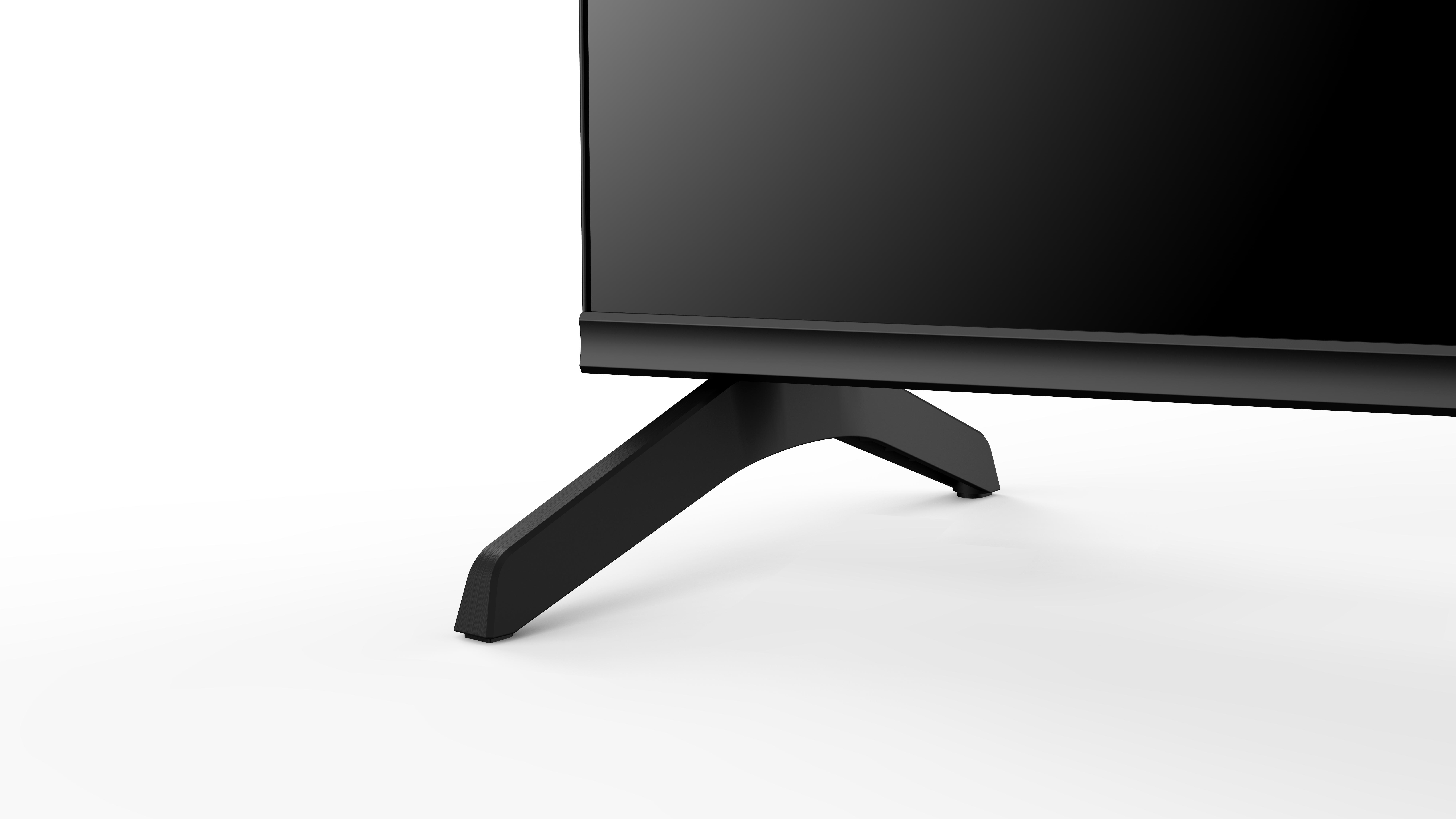 Ein schwarzer TV-Ständer mit einem Fernsehbildschirm auf weißem Hintergrund.