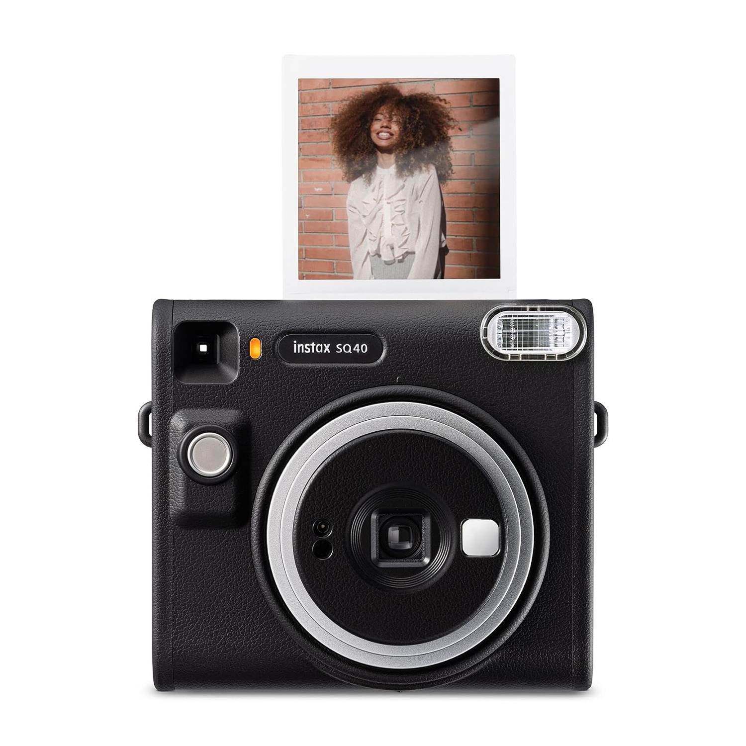 Una fotocamera nera con la foto di una donna.