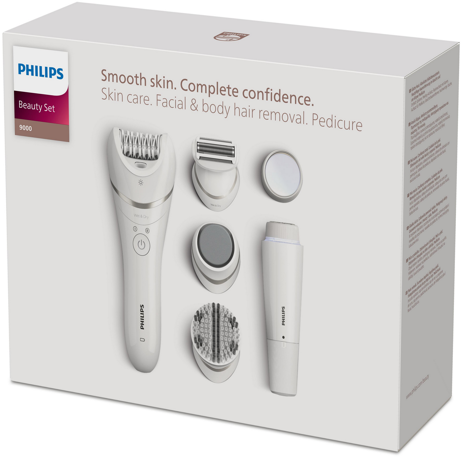 Een witte Philips beauty set doos met verschillende opzetstukken.