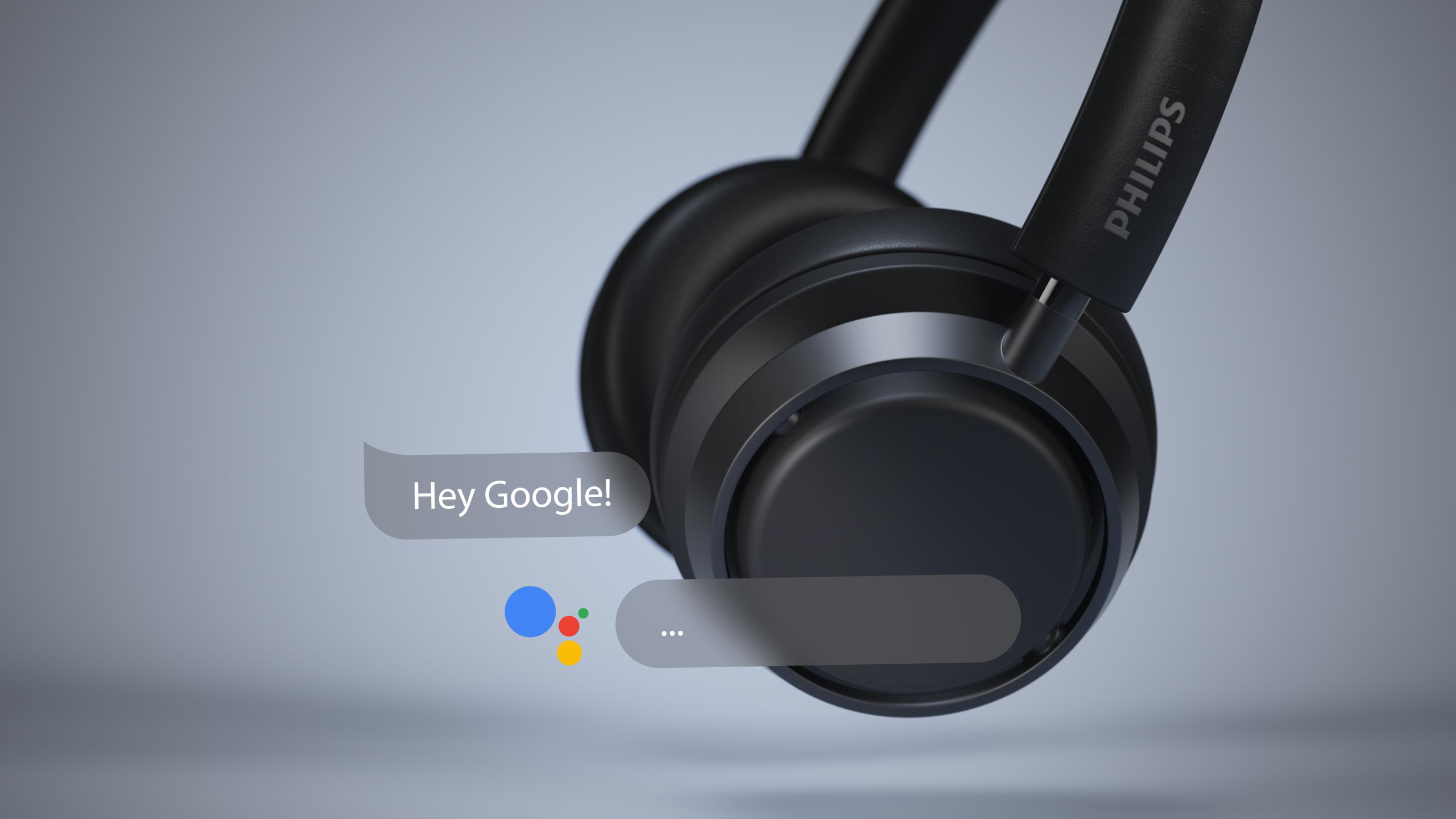 Schwarze Kopfhörer mit Sprechblase mit "Hey Google!". Google-Logo auf der Blase.