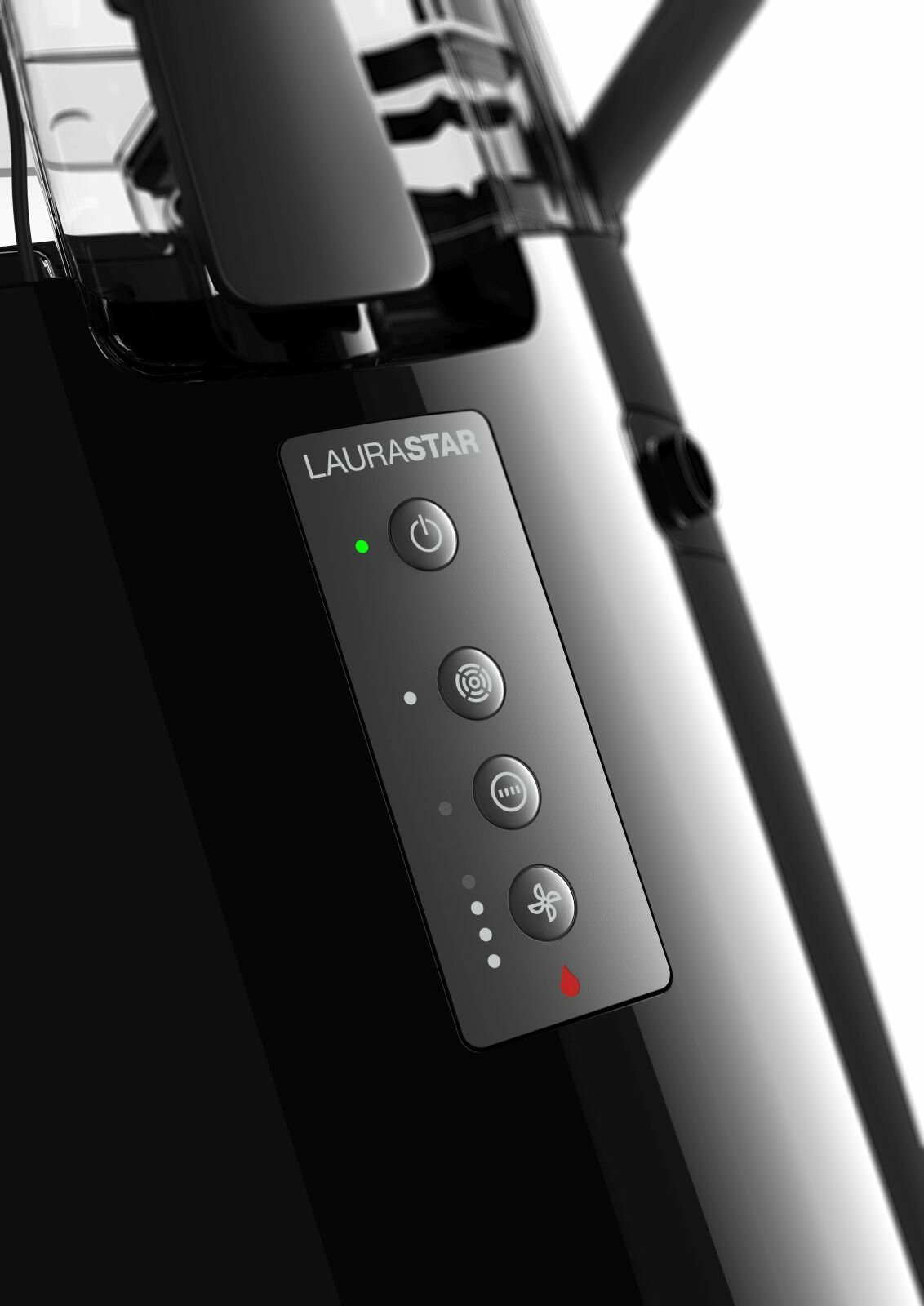 Czarne urządzenie z przyciskami. Widoczne jest zielone i czerwone światło.