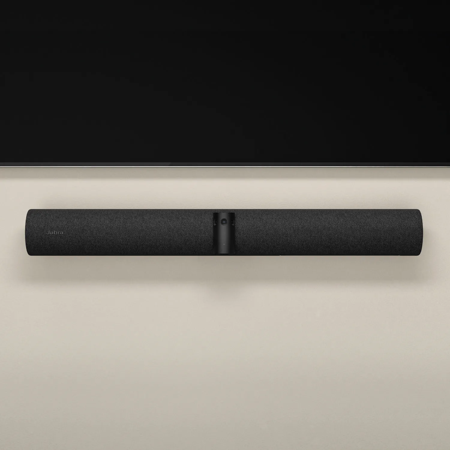Eine schwarze Soundbar an einer beigen Wand montiert, mit einem schwarzen Fernseher darüber.