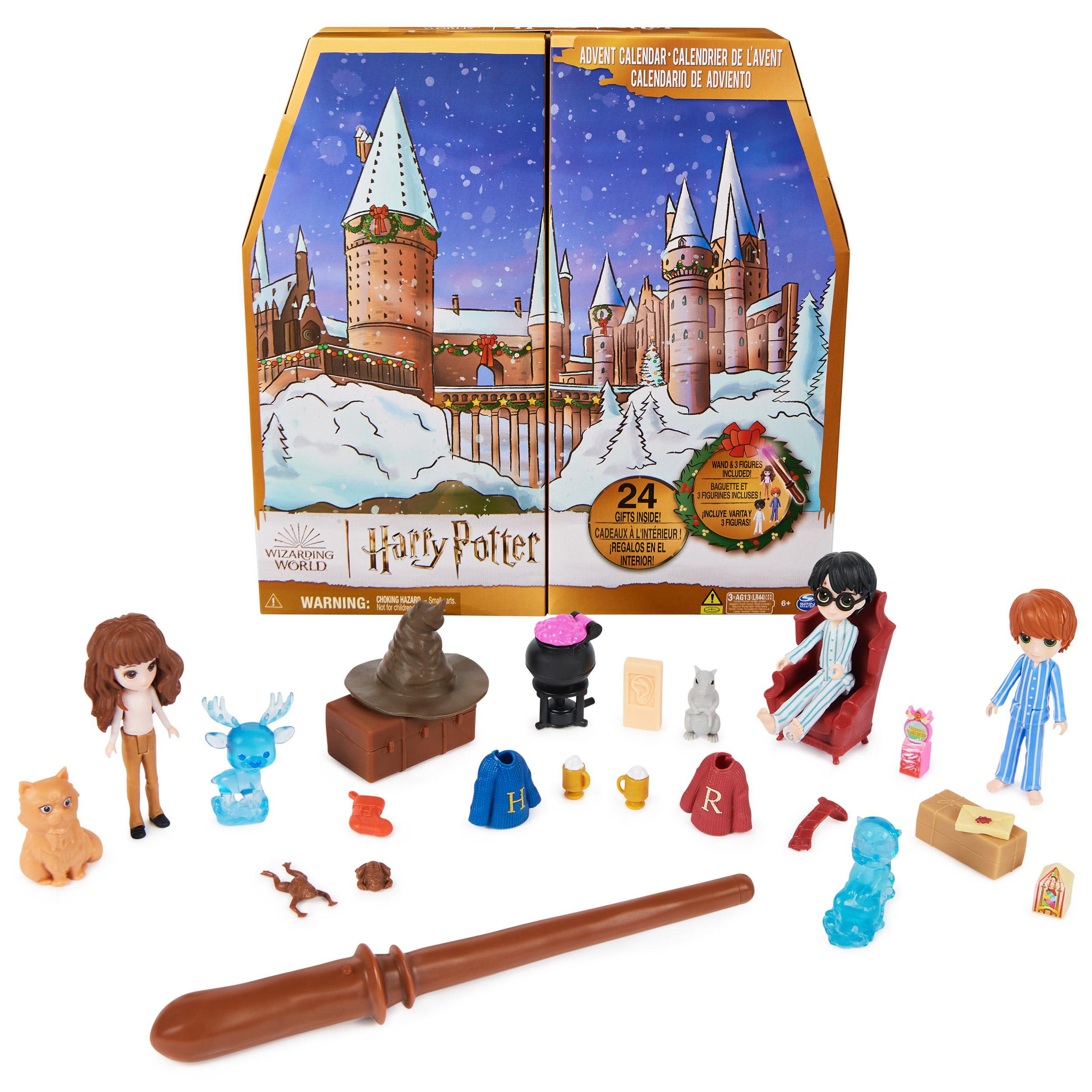 Harry Potter Adventskalender mit Figuren und Gegenständen. Im Hintergrund Hogwarts im Winter.
