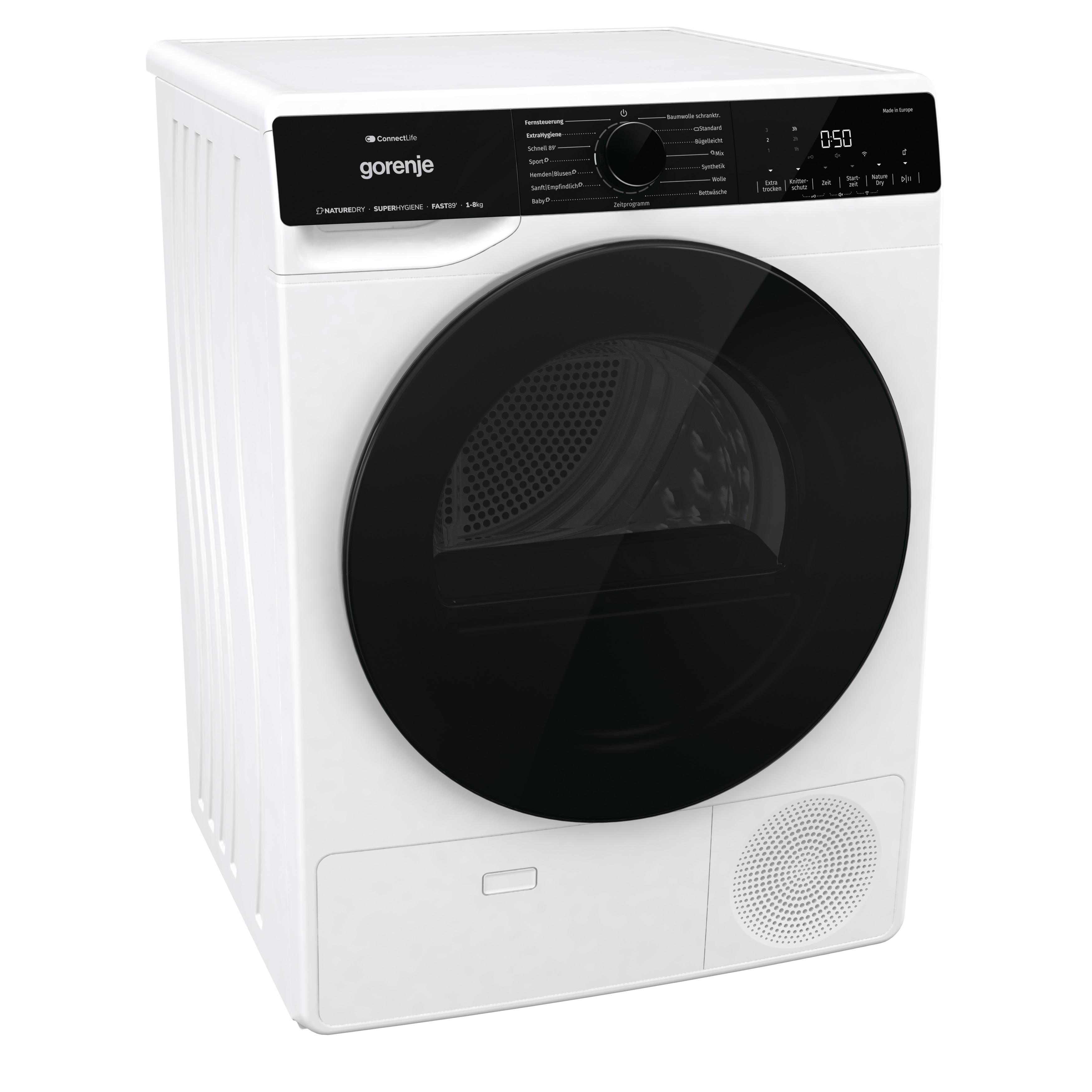 Eine weiße, moderne Waschmaschine mit schwarzer Tür.
