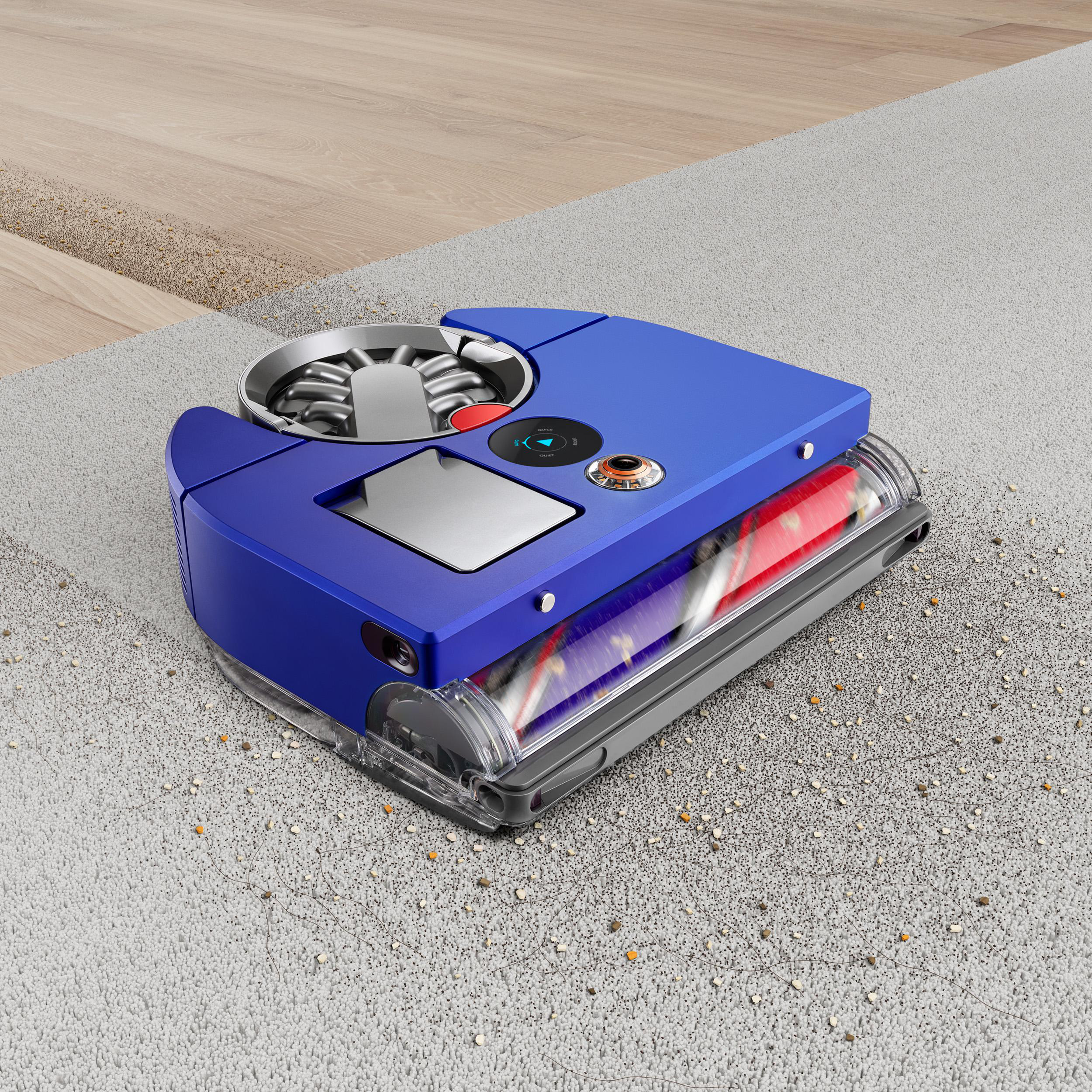 Ein blauer und grauer Roboter-Staubsauger auf einem grauen Teppichboden.