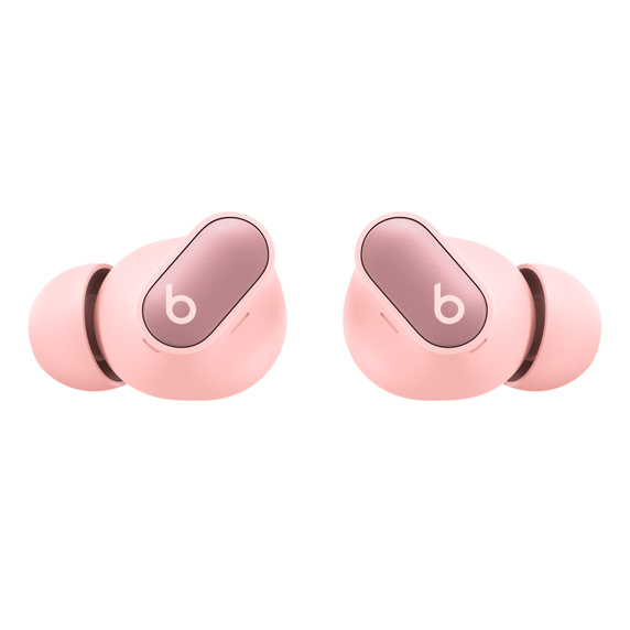 Dos auriculares inalámbricos rosas, ambos con el logotipo 'b' blanco, sobre una superficie blanca.