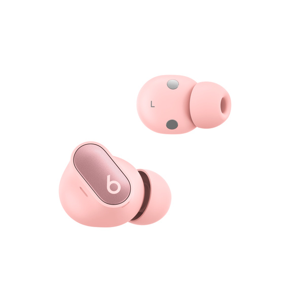 Dos auriculares Beats rosas sobre un fondo blanco. Uno tiene la letra 'L'.